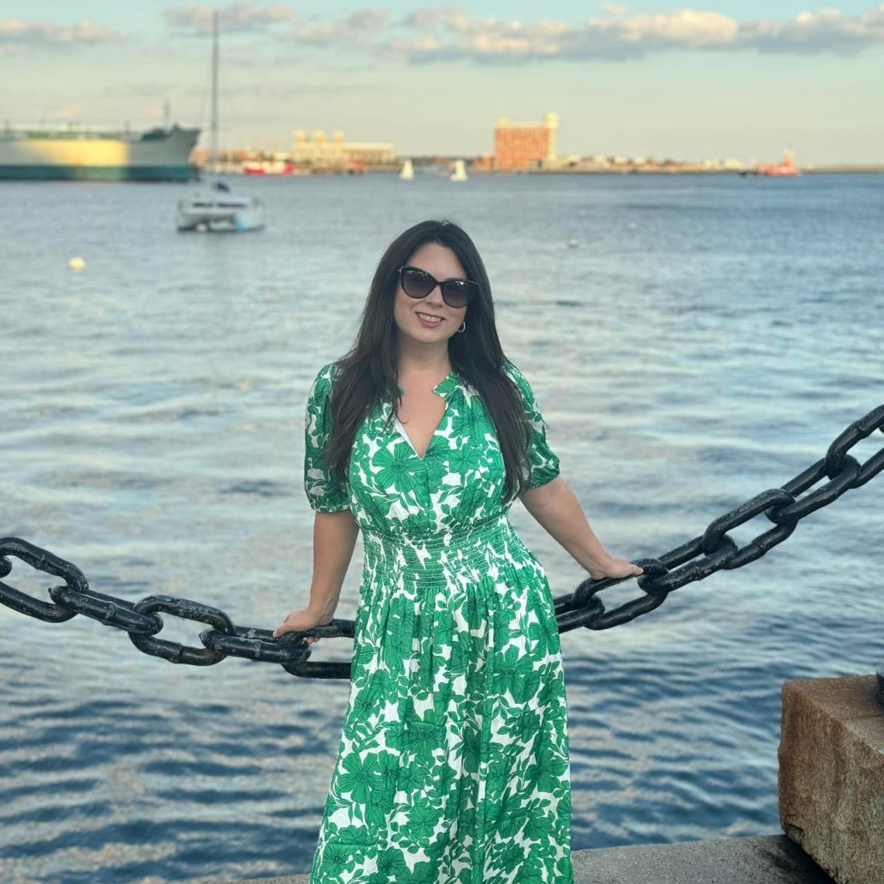 Women in a dress by the sea