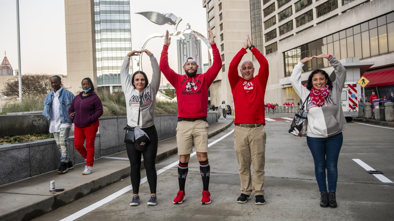 Adults signaling O-H-I-O